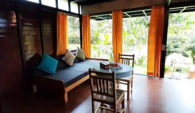 Luxury cottages in lush green panoramic windows