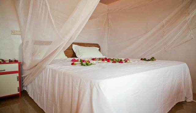 Madhu Beach Huts