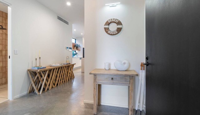 Nobby Beach Designer Villa | Ocean Views, Plunge Pool, Walk to Bars & Dining.