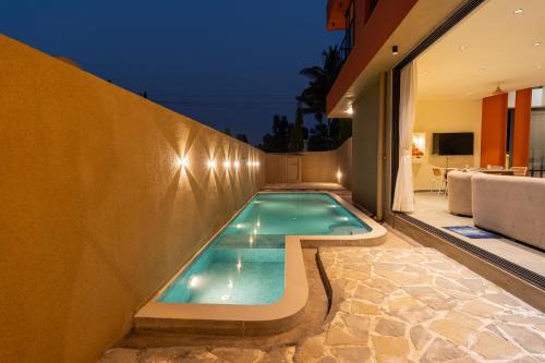 SaffronStays Ivory and Orange