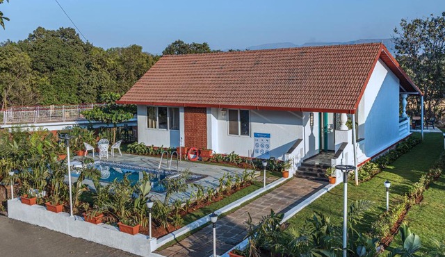 SaffronStays Mariposa Rio- 2BR Goan-style riverside pool villa with machan, garden & bonfire near Mumbai