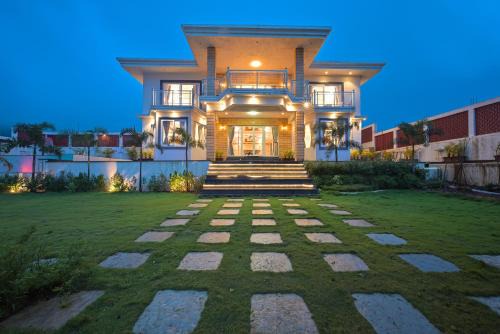 SaffronStays Zeel by the Lake - 4BR lakefront pool villa with gazebo, games room & stunning Bhavali Dam views