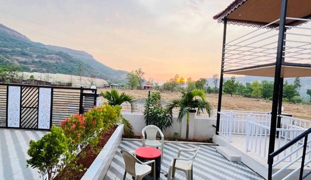 Sanvi farmhouse. Hill view with waterfalls.