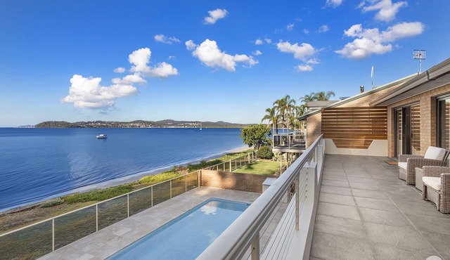 Seaside Sanctuary - Waterfront Luxury Home with Heated Pool