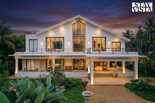 StayVista at Hermes Cove with Pool, Lawn
