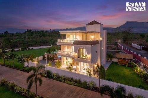 StayVista at House of Dawn with Pool, Lawn