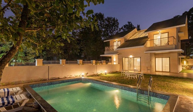 StayVista's Enchanting Haven - Modern Interiors, Sprawling Lawn with Gazebo, Swimming Pool, Indoor Games