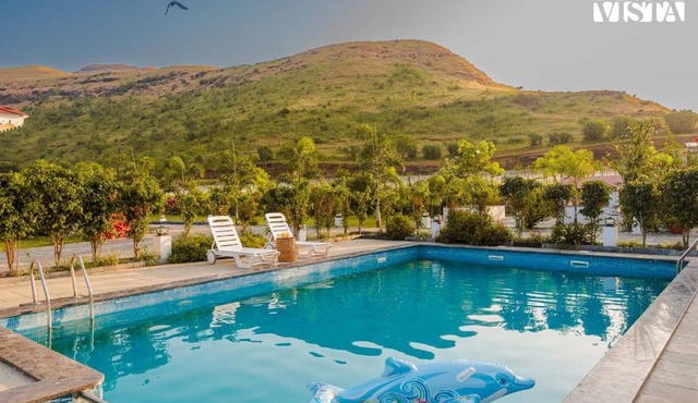 StayVista's Hill Crest Mansion - Hill-View Villa with Private Pool, Deck, Lawn & Gazebo