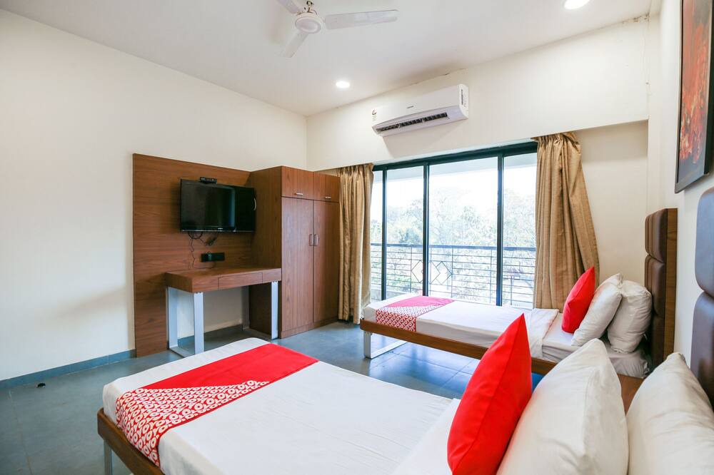 Khanvel Hotel | OYO Flagship Hotel Green-acre