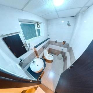 Photo of Bathroom in Kuppaayil