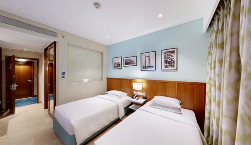 Deluxe Room, 2 Twin Beds, Smoking, City View