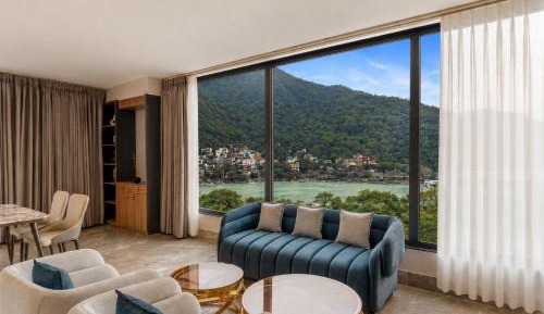 Celebrity Suite With Ganges with complimentary Welcome Drink on arrival and evening Hi- Tea at restaurant between 4pm to 6pm