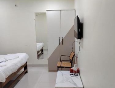 Deluxe Room (2 Adults + 1 Child)