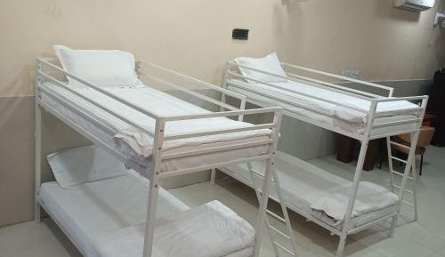 Single Bed in Dormitory Room