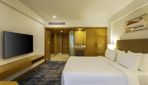 Junior Suite with Complimentary 2 IMFL Drinks , 2 Pieces of Laundry per stay and 20% discount on Spa.