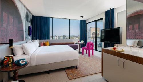 King Suite with Balcony and City Skyline View - High Floor