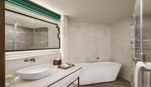 Premium King Suite with Sofa Bed: Enjoy INR 1500 hotel credits per stay