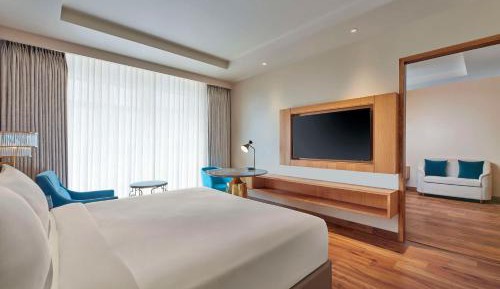 Business Suite with Pool View | INR 500/- credit on food & beverages per stay | 15% discount on spa & laundry | Happy Hour till 6pm 1+1 on IMFL and 2+1 on Beer