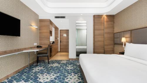 Premium Room with 25% discount on F&B and Laundry, 20% on Spa and Enjoy Buy One Get One at Viva Bar during Happy Hours (12 noon to 06:00 PM)