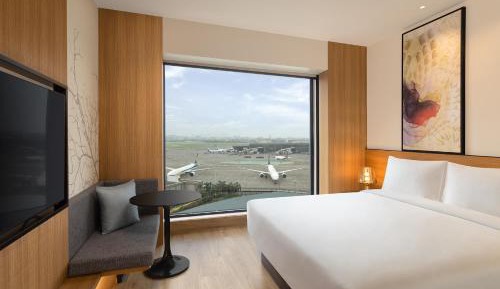 Deluxe Queen Room with Garden View with 50% discount on Buffet , 10% off on Airport Transfers , Laundry and Happy Hours on beverages enjoy 1+1 offer on select beverages