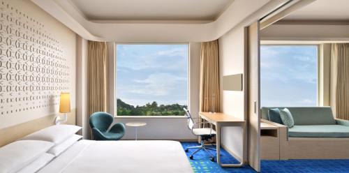 Queen Studio Suite with Sofa Bed and City View