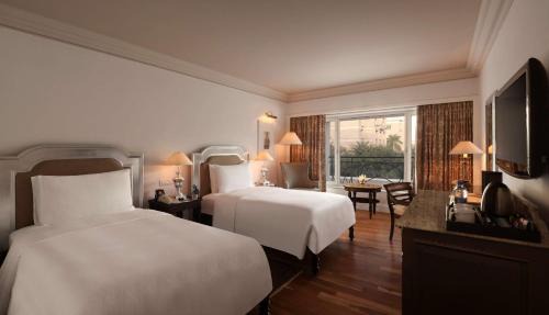 Twin Room with Happy Hours 1+1 offer at Lounge Bar , 20% off on Food & Beverages and Spa