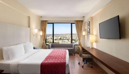 Suite with City View:Enjoy Happy Hours with 1+1 offer on Alcoholic Beverages | 10% off on Food & Beverage services | Guaranteed Early check-in & Late check-out by 3hrs  
