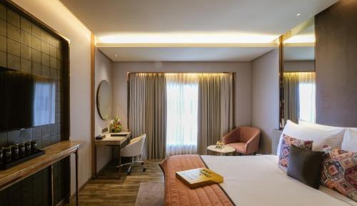 Luxury Pool View with INR 1,000 off on a 60min Spa, Buy 1 Get 1 complimentary IMFL drink between 5pm and 7pm at Aqua, 15% off on F&B and Laundry