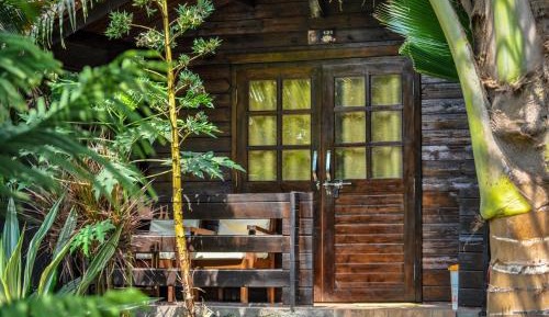 Deluxe AC Wooden Cottage Garden View