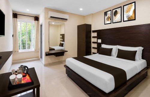 Mancherial Hotel | Super Townhouse Oak Mancherial Railway Station Formerly Vishnu Residency