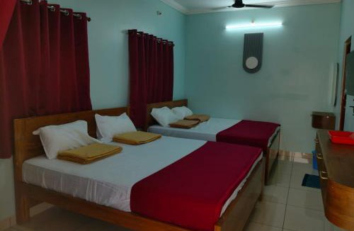 Thirunallar Hotel | Malar Residency