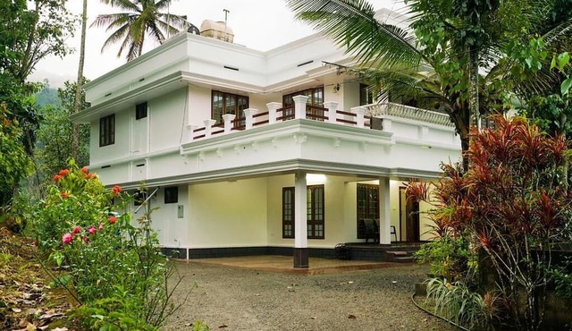 Posh Rooms/Peaceful and Green Part of Munnar